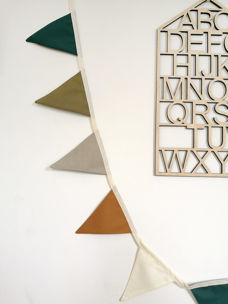 SAFARI_Beautiful handmade fabric bunting in soft earthy tones — olive green, forest green, light grey, off-white, and mustard ochre. Perfect for a woodland or boho-inspired nursery, birthday party, baby shower, or photo shoot. The Butter Fying